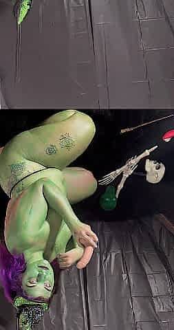 Large titty green witch stuffing her cauldron