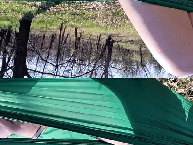 Teen girl caught masturbating in a hammock outdoors.