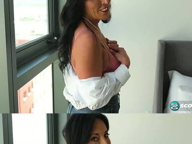 54-year-old Abi James shows off in front of a wide-open window