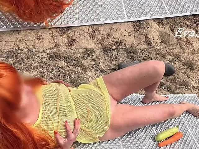 multiorgasm from vegetables of a red-haired wench in nature