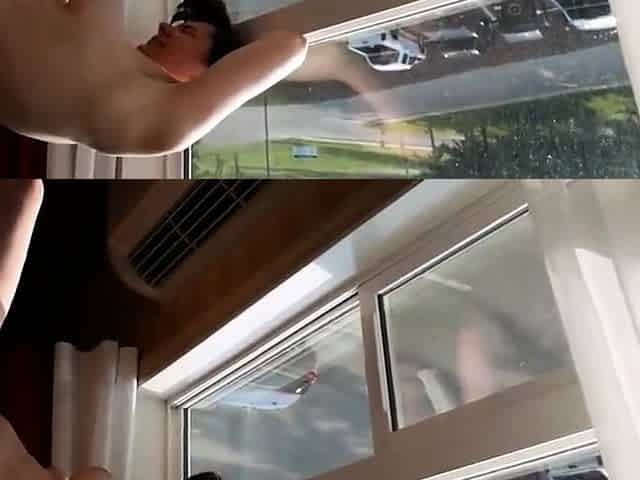 Amateur MILF Masturbates by the Window