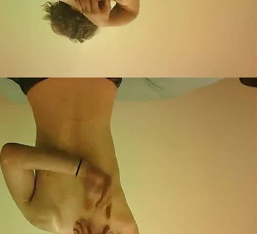 Topless Transgirl Shaking Own Hands Behind Her Back