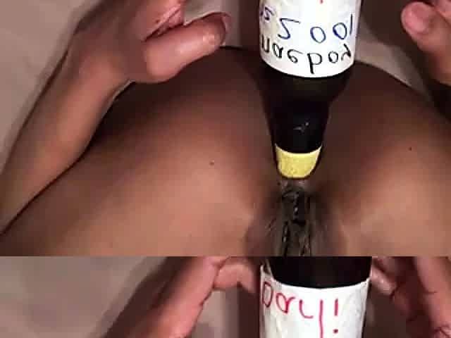 Slut Takes Bottles Up Her Asshole, Pussy And Mouth
