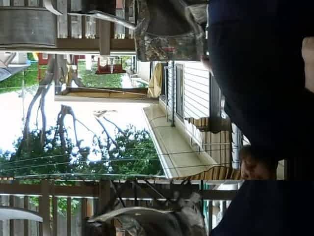 Obese dudes sitting outside pleased