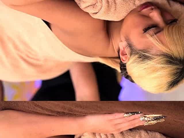 Amateur Asian babe sucks a lolly as she rubs her pussy