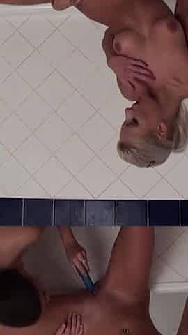 Lesbian pussy licking dildo playing in the bathroom