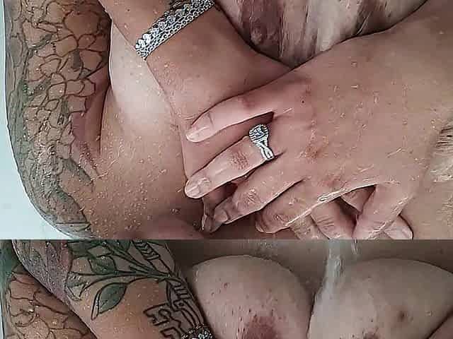 The wife soaping up her melons in the shower