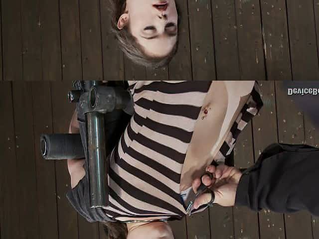 Cutting a cute girl's shirt and toying her pussy in bondage device