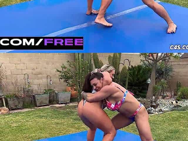 Topless Muscle Queens Clash in Intensive Wrestling Showdown