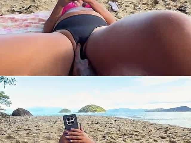 Squirting on the beach with the fisherman watching and thoroughly enjoying it.