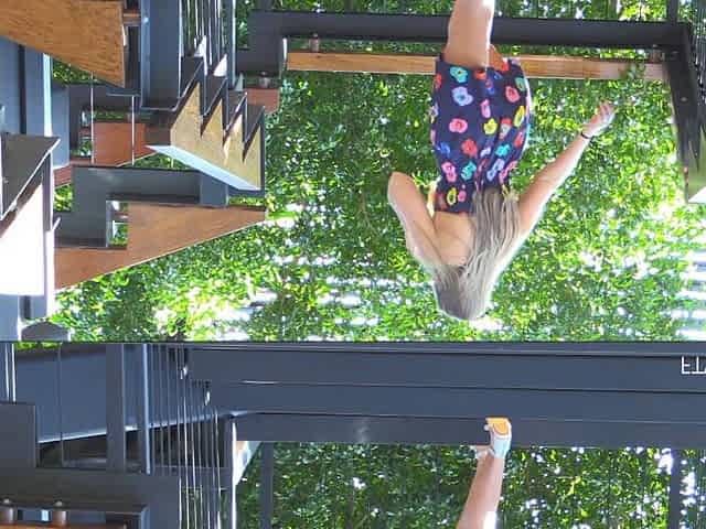 Teen lifts her dress and fucks a vegetable outdoors