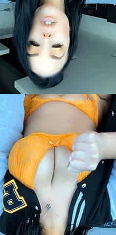 Brunette seductress working her big boobs and hot ass