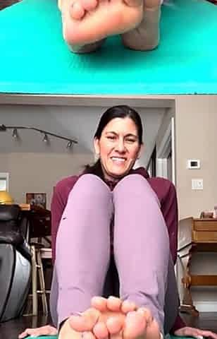 Brunette with foot fetish rubs big dick with her feet in POV