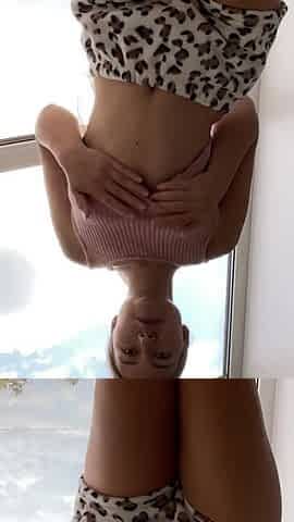 Blonde Seduces Near the Window