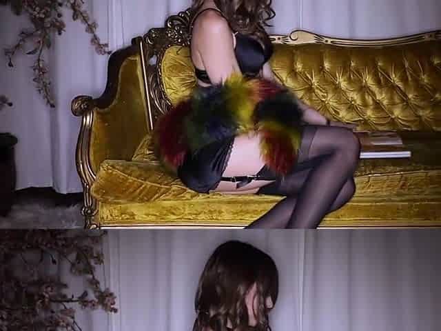 A doll in black with doll masturbating