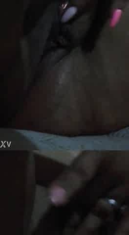 Plump black touching herself