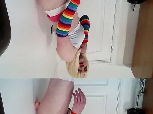 cute sissy banging her sex tool against the wall