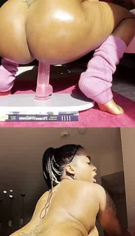 Oiled up Ebony fucks big dildo