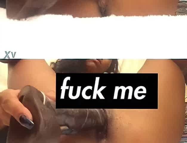 Black using her vibrator cumming