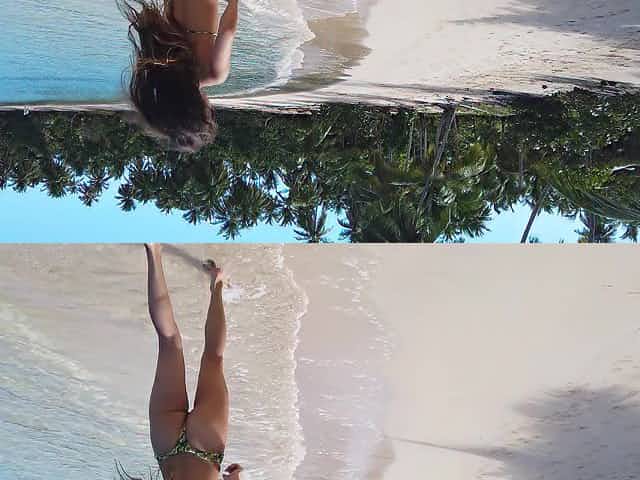 Pretty young model in bikini is posing on the beach