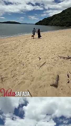 Trio on the beach - this chab pulled her bikini to the side and inserted his very pleasurable weenie into her.