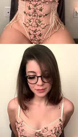 Pink labia close up of naive brunette playing with her name