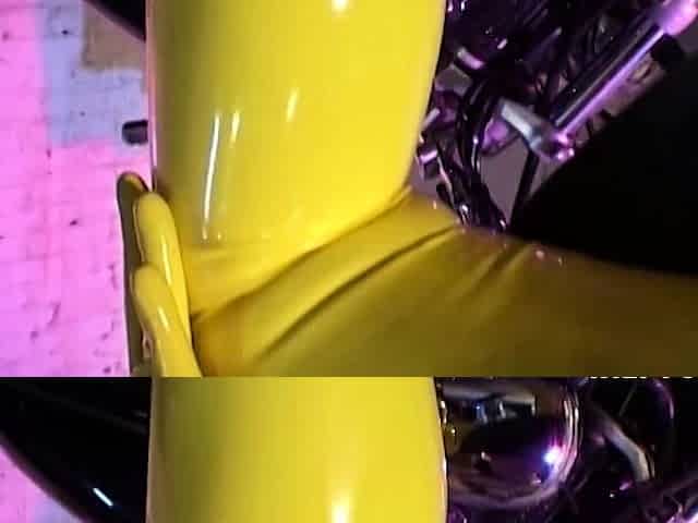 Latex lesbians pleasing their holes