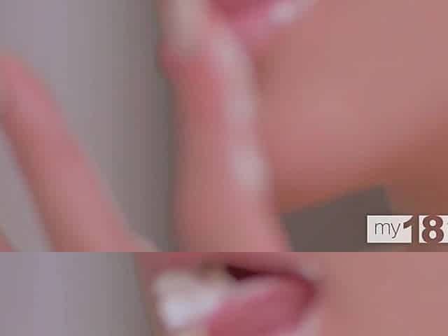 A small cutie screws herself with a sex tool
