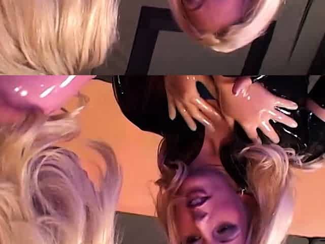 Latex lesbians pleasing their pussies