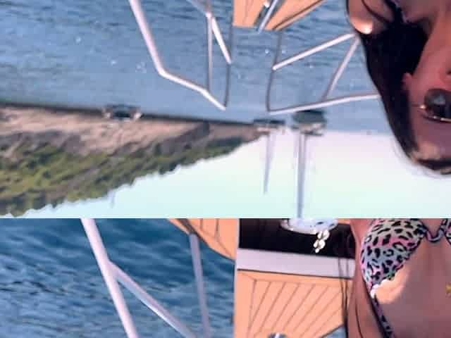 HOT BRUNETTE IN A BIKINI GETS AN ORGASM ON YACHT WHITH