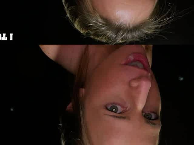 A woman receives a cumshot in her mouth through a gloryhole.