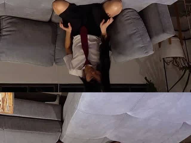 Asian teen schoolgirl bouncing up and down on a big white