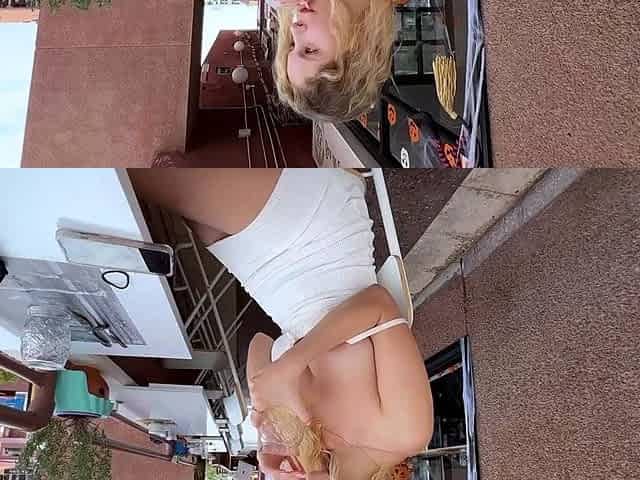 Blonde is flashing her big boobs in the outdoors