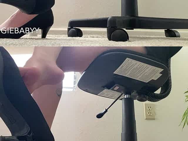 Secretary Dangles Black Heels at Desk