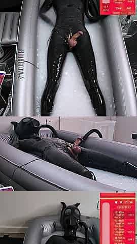 Electro stimulation milking training of a latex puppy moist in jizz pool