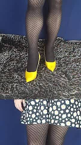Checkered tights, high heels and mini costume