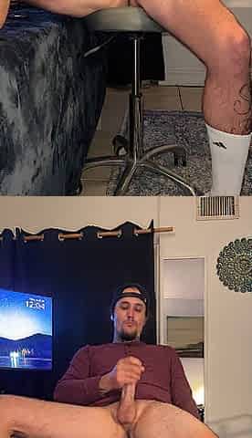 Sexy tatted chap, legs widen and leaned back wanking his large butt schlong
