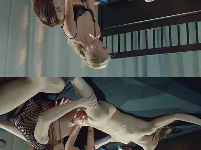 Two blonde mature lesbians licking and fingering on couch