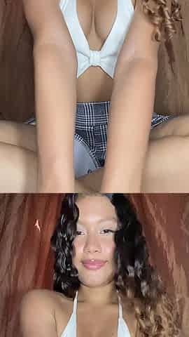 Innocent Girl with a Tender Face Masturbates Her Pussy in a Miniskirt