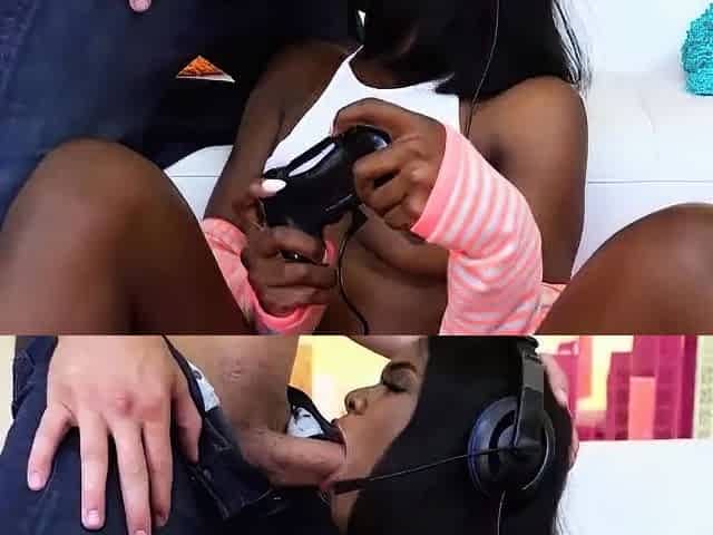Ebony female gives white man a oral pleasure while gaming