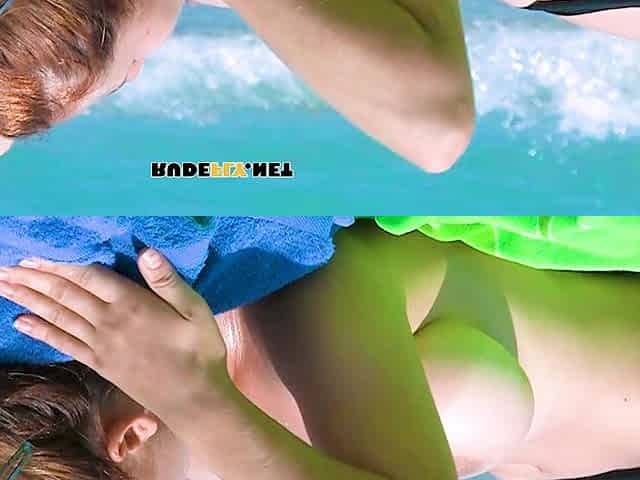 Smoothest nudist play in the warm water at a nudist beach