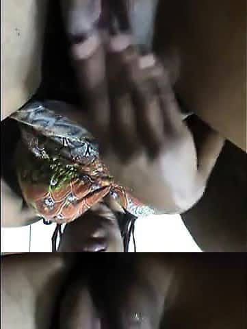 Horny black cam girl fingering her black pussy up close