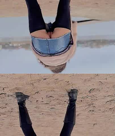 Walking along the beach out of pants.