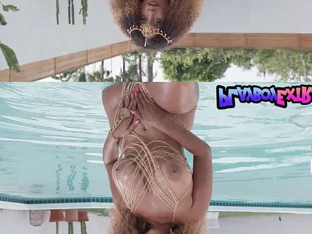 Nude ebony BBW muse swimming in the pool