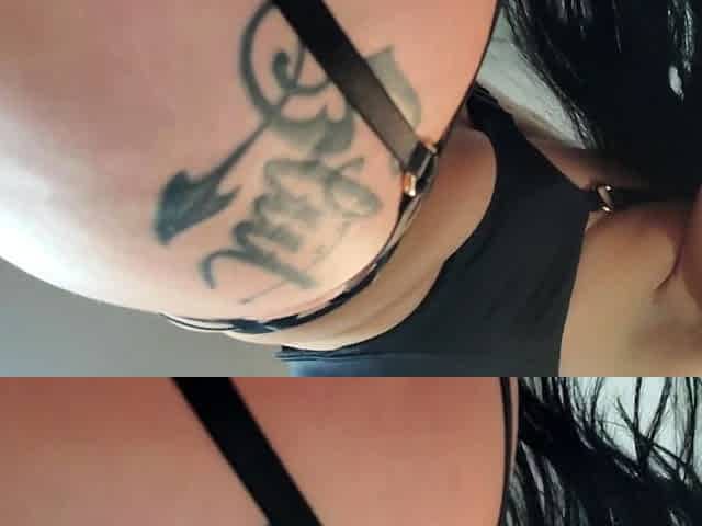 A super sexy brunette massages her big boobs