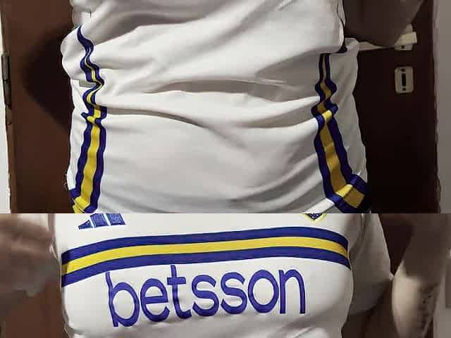 Getting warmed up in advance of the football match... female fan undressing...