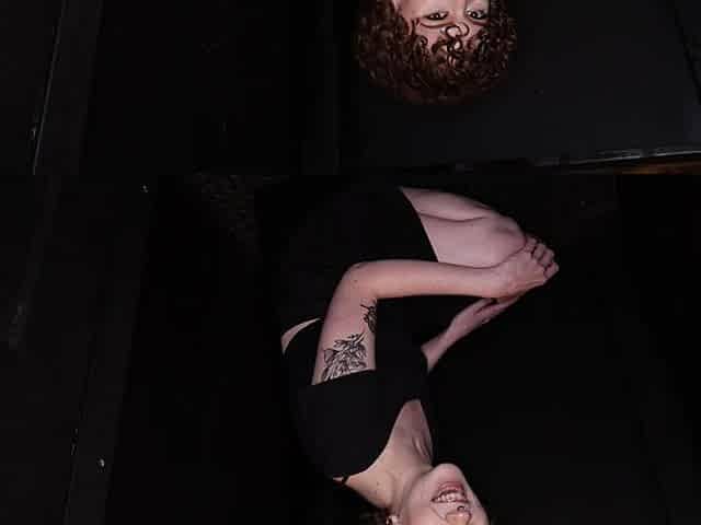 Ash Fatale, the big mouth slut, swallows a load through a gloryhole.