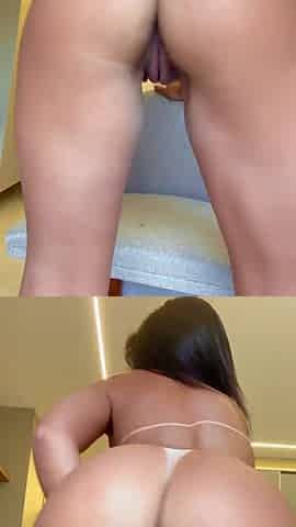 Sexy angel enjoying herself with a dildo.
