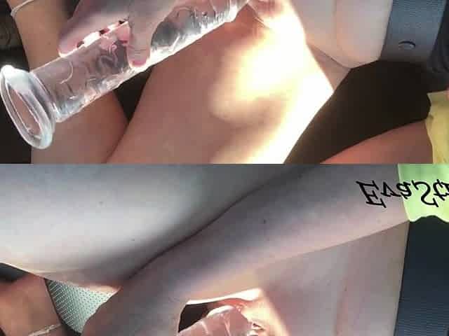 screwing myself with a large sextoy in the car