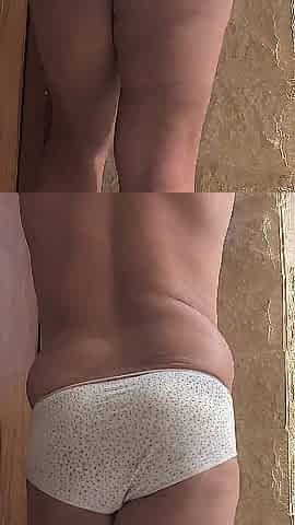 John takes off his underclothes, nude